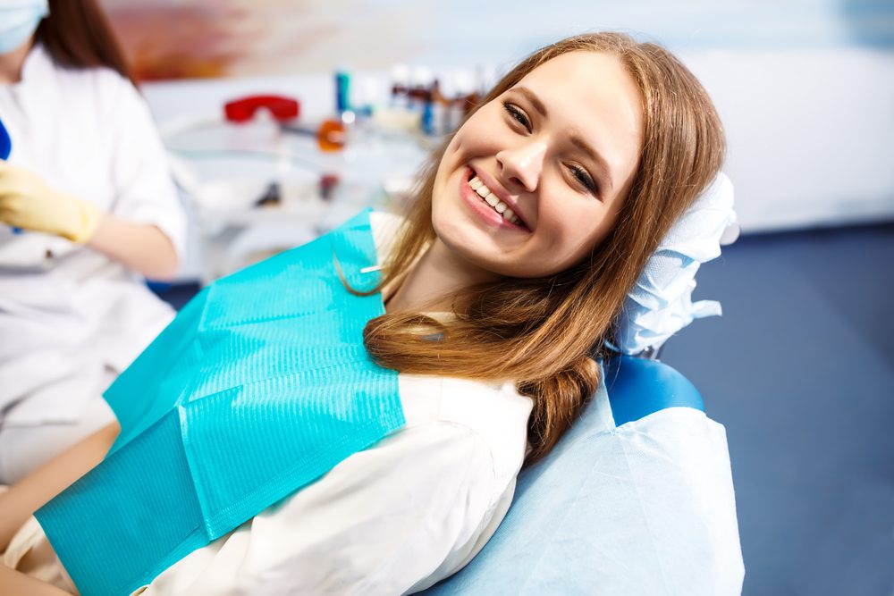 Woman Smiling during dental visit